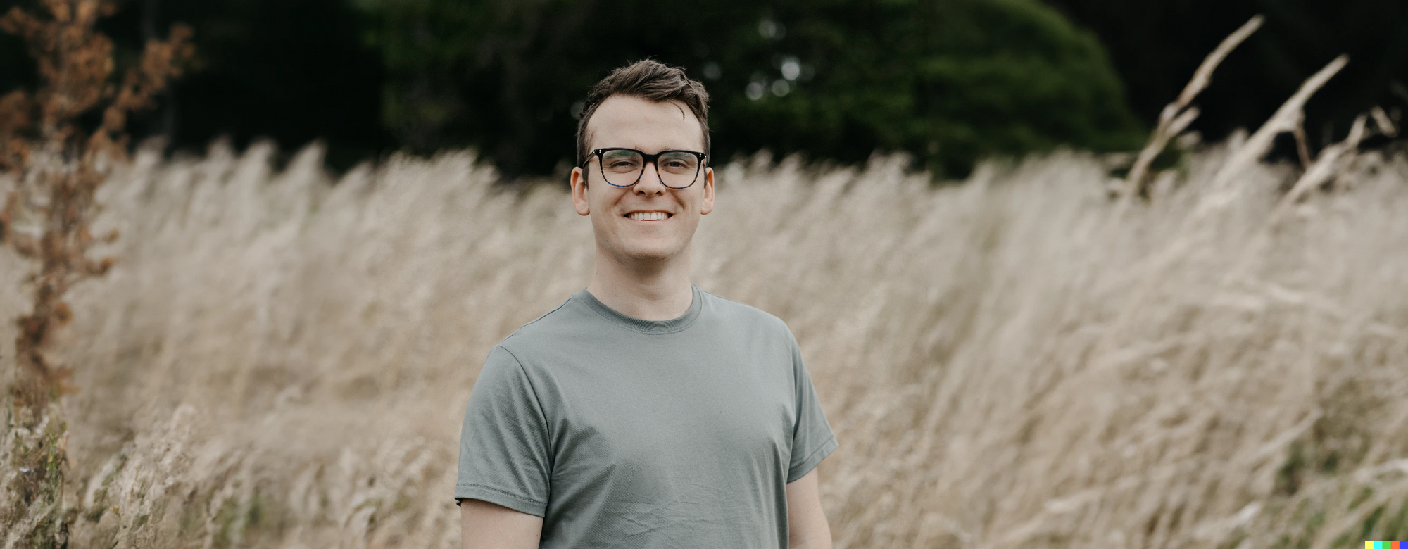 Joshua Whitcombe standing in a field
